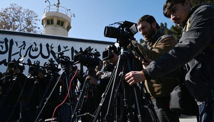 Afghanistans journalists covering an event. — AFP/File