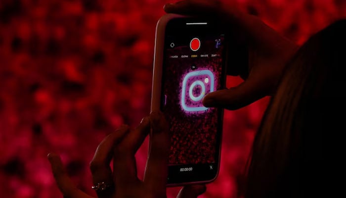 A logo of mobile application Instagram is seen on a mobile phone, during a conference in Mumbai, India, September 20, 2023.— Reuters