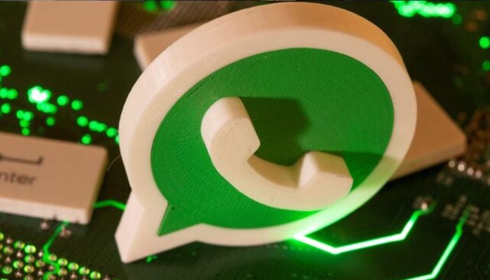 A 3D printed WhatsApp logo and keyboard buttons are placed on a computer motherboard in this illustration taken January 21, 2021. — Reuters