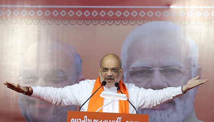 Amit Shah, Indian Home Minister and a leader of Indias ruling Bharatiya Janata Party, addresses party supporters during an election campaign rally in Ahmedabad, India, April 30, 2024. — Reuters