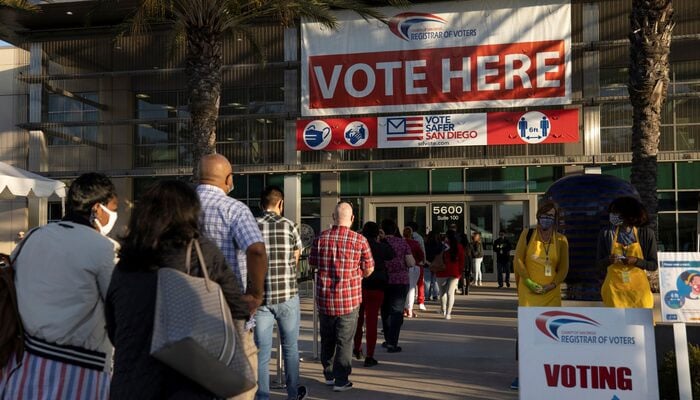 Poll workers wait in line to grab breakfast prior to the opening of voting at the Registrar of Voters on the day of the US presidential election in San Diego, California, US November 3, 2020. — Reuters