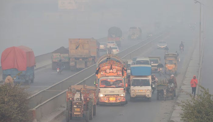 Vehicles move amid dense smog in Lahore, Pakistan November 24, 2021. — Reuters