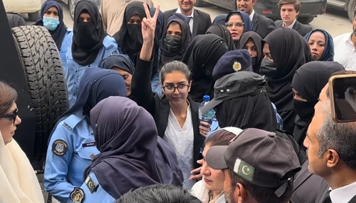 Prominent human rights lawyer Imaan Mazari gestures as she is presented before a court in Islamabad. — X/@Shaharyarnaqvi2