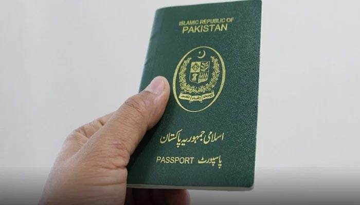 This photograph shows a book of Pakistani passport. — Radio Pakistan