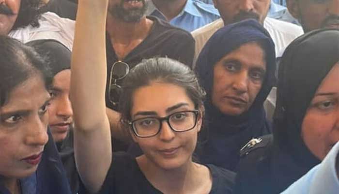 Prominent human rights lawyer Imaan Mazari gestures as she is presented before a court in Islamabad in this undated picture. — X/@JavedMengal_