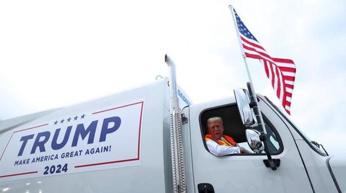 Trump responds to Biden’s ‘trashy’ remark with garbage truck gimmick