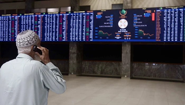 A broker talks on the phone at the Pakistan Stock Exchange in Karachi on May 20, 2024. — PPI