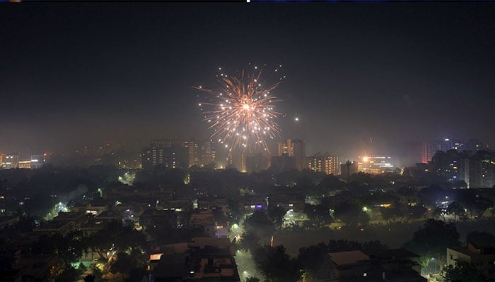 Firecrackers explode over the residential colony to celebrate Diwali, the Hindu festival of lights, in Ahmedabad, India, October 31, 2024. — Reuters