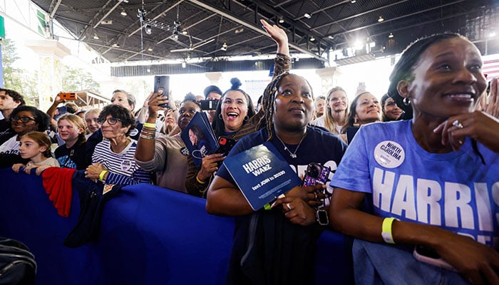 Supporters attend Democratic presidential nominee US Vice President Kamala Harris campaign rally at Coastal Credit Union Music Park in Raleigh, North Carolina, US, October 30, 2024. — Reuters