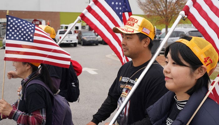 Supporters of Donald Trump before a rally in Rocky Mount, North Carolina, US on October 30, 2024. – Reuters