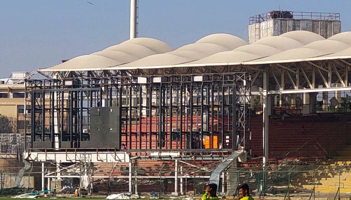 Main electronic screen being removed for relocation at National Stadium Karachi. — Reporter