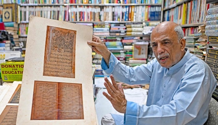 Sikander Mirza Changezi, the co-founder of Hazrat Shah Waliullah public library, speaking during an interview with AFP, at his library in Urdu Bazar in the old quarters of Delhi on October 22, 2024. —AFP