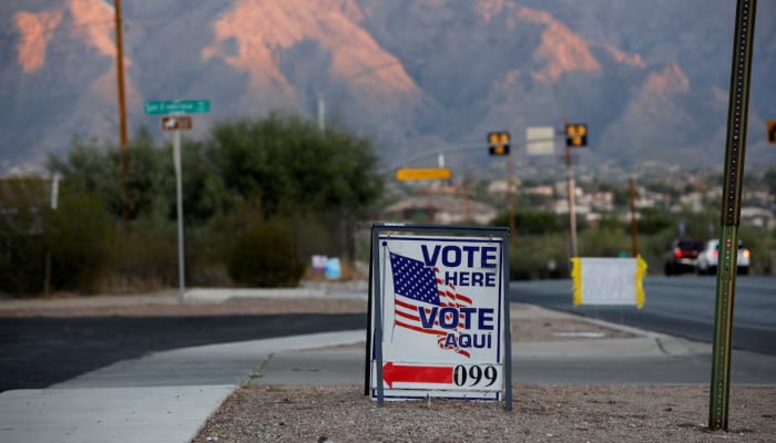 Sign directs voters to a polling station on Election Day in Tucson, Arizona, US November 3, 2020.—Reuters