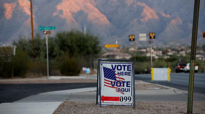 Harris and Trump locked in tight race in swing states