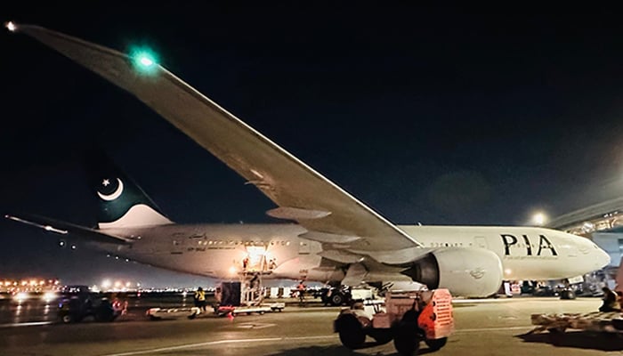 This undated photo shows a PIA plane at an airport. — Facebook/@PakistanIntAirlines