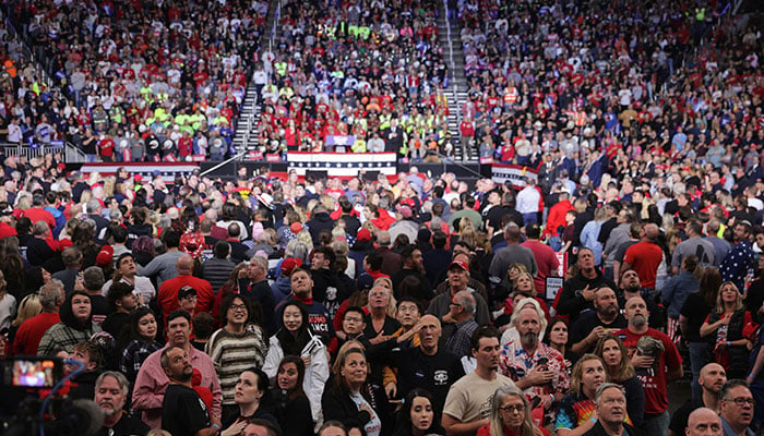 Supporters of Republican presidential nominee and former U.S. President Donald Trump sing the national anthem during a campaign rally in Pittsburgh, Pennsylvania, U.S., November 4, 2024. — Reuters