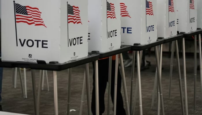 Voting booths are pictured inside the Dona Ana County Government Center during early voting for the upcoming midterm elections in Las Cruces, New Mexico, U.S., October 24, 2022. REUTERS