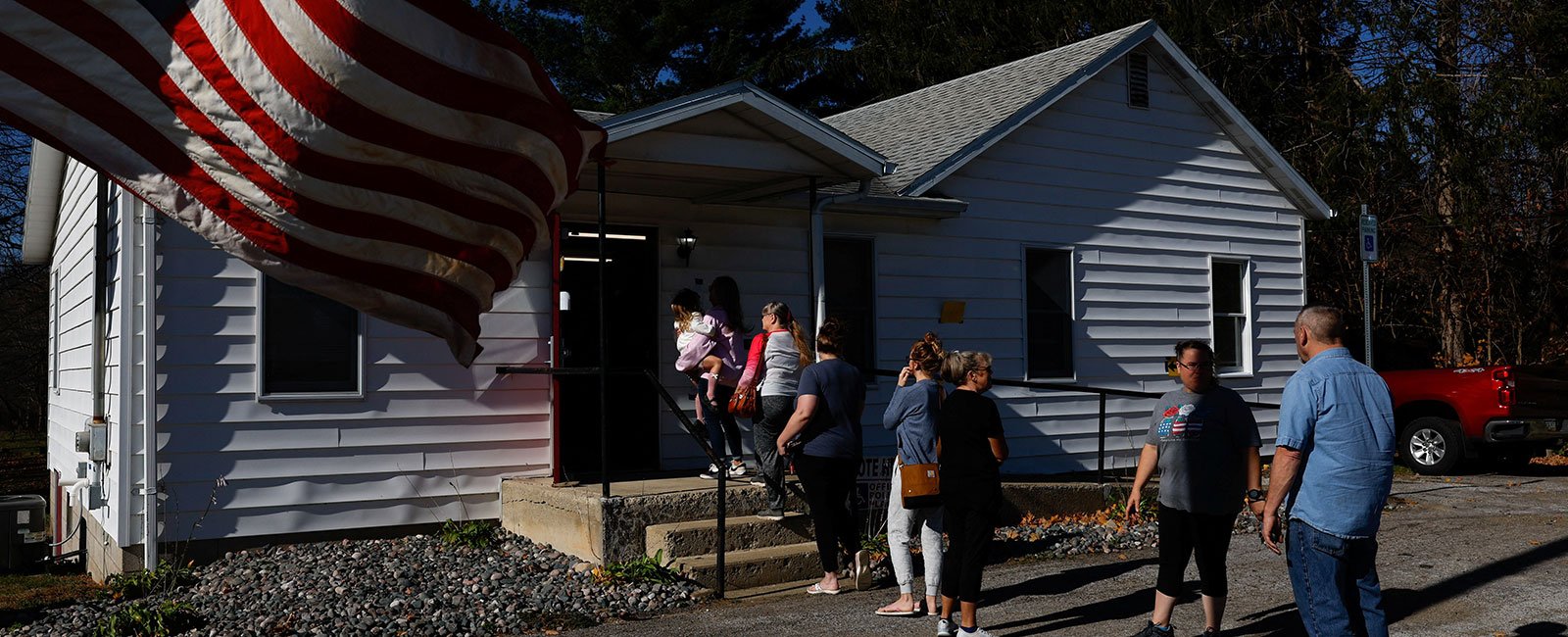 People stand in line outside a polling station to vote during the 2024 US presidential election on Election Day, in Springfield, Pennsylvania, US, November 5, 2024. – Reuters