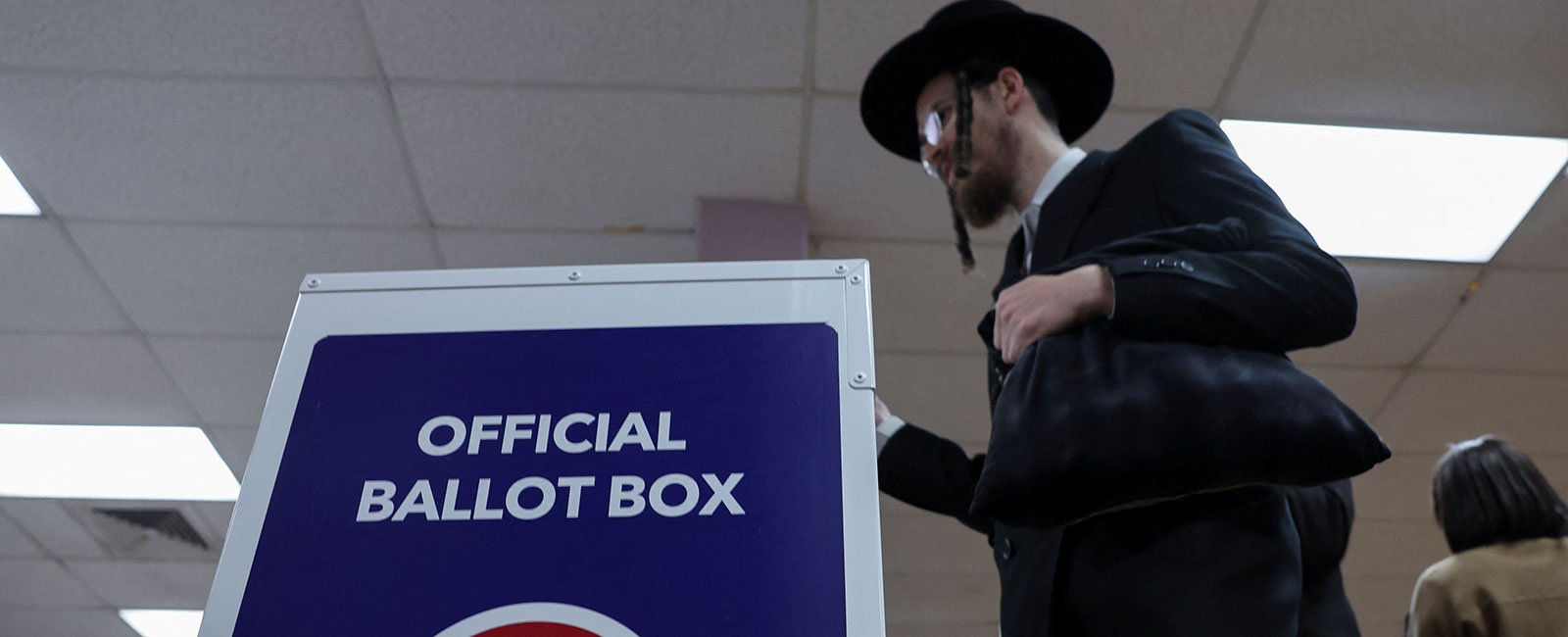 Members of the Orthodox Jewish community and other residents vote at a polling station on Election Day in the Brooklyn borough of New York City, US, November 5, 2024. – Reuters