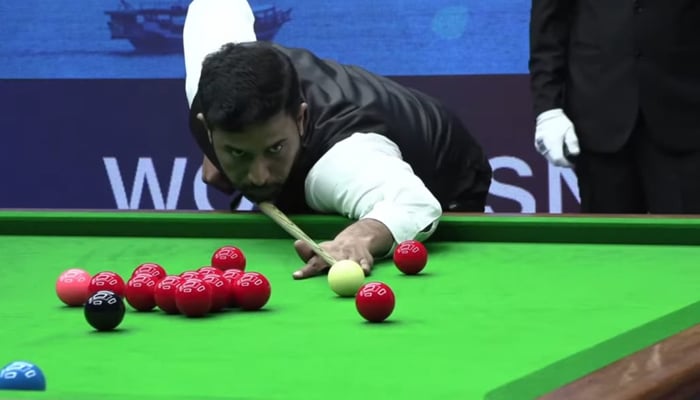 Pakistani cueist Muhammad Asif in action during IBSF World Snooker Championship. — Reporter