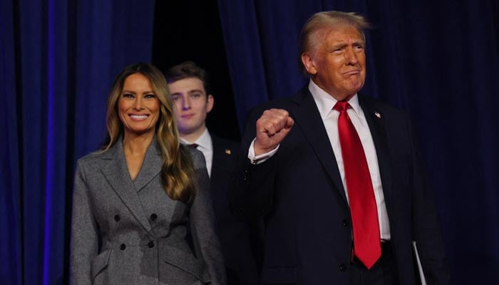 Republican presidential nominee and former US president Donald Trump makes a fist as he takes the stage with his wife Melania and son Barron to address supporters at his rally, at the Palm Beach County Convention Center in West Palm Beach, Florida, US, November 6, 2024. — Reuters