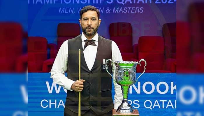 Pakistans Muhammad Asif poses with the trophy after winning his third IBSF title on November 6, 2024. — Instagram@ibsf.media