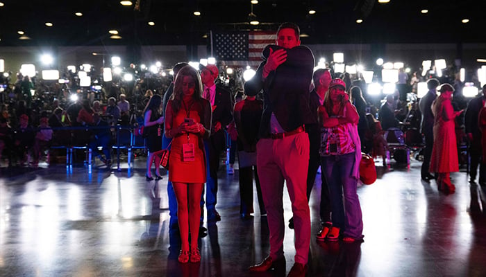 Supporters of Republican presidential candidate Donald Trump watch election results as they attend his election night event at the West Palm Beach Convention Center in West Palm Beach, Florida, on November 5, 2024. — AFP