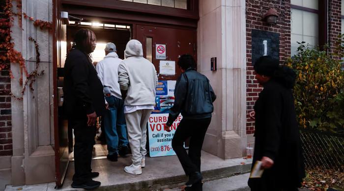 Hoax bomb threats linked to Russia target polling places in battleground states, FBI says