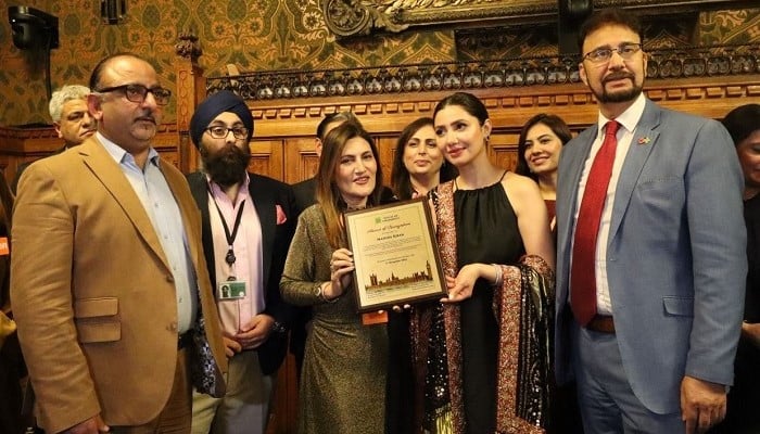 Pakistani actress Mahira Khan receiving an award in the UK Parliament in recognition of her contributions to the global cinema and her role as a cultural ambassador. — Reporter