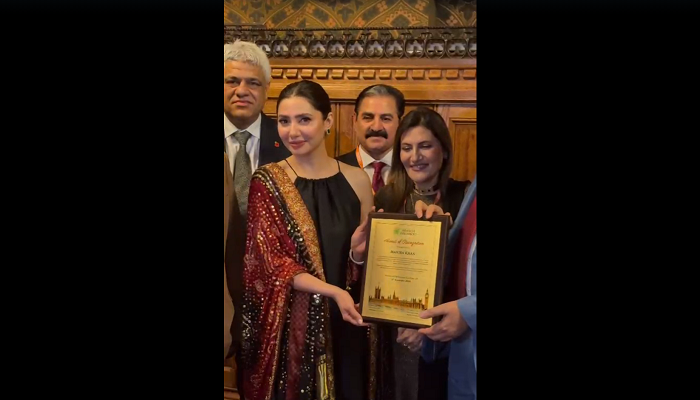 Pakistani actress Mahira Khan receiving an award in the UK Parliament in recognition of her contributions to the global cinema and her role as a cultural ambassador. — Reporter