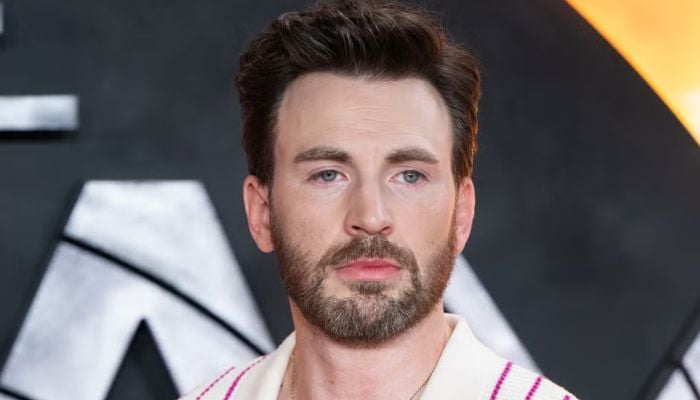 Chris Evans ditches signature style at Red One event