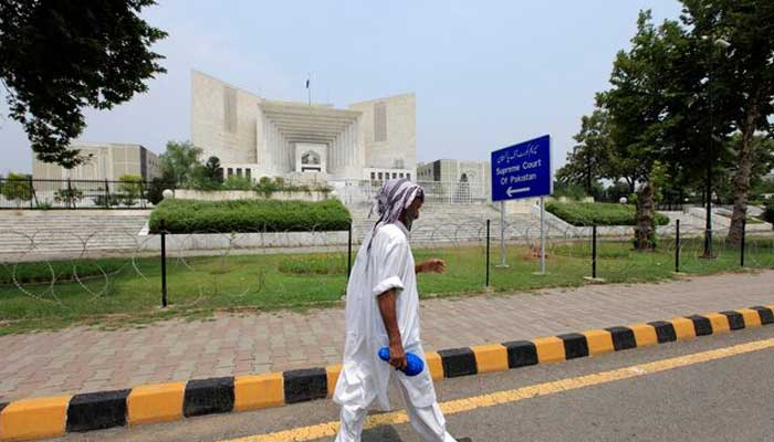 A man walks past the Supreme Court building in Islamabad, Pakistan, June 27, 2016. — Reuters