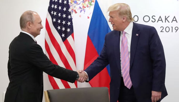 Russias President Vladimir Putin shakes hands with US President Donald Trump during a meeting on the sidelines of the G20 summit in Osaka, Japan on June 28, 2019. — Reuters