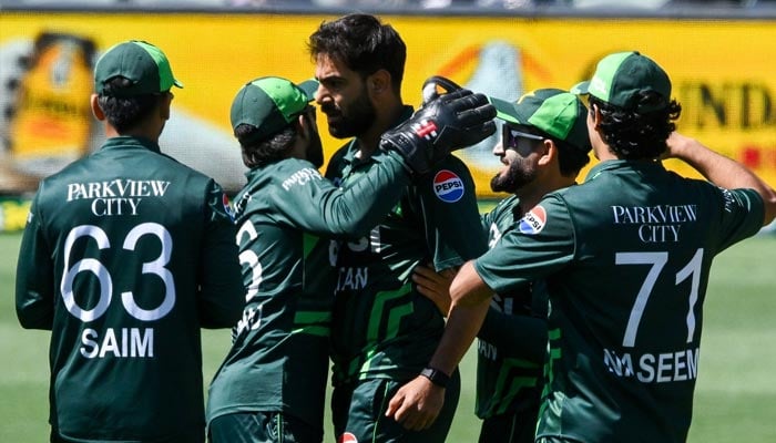 Pakistans team celebrates with Haris Rauf during their second ODI against Australia at Adelaide Oval on November 8, 2024. — Facebook/Pakistan Cricket Team