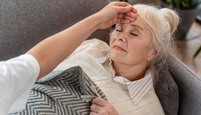 A representational image depicting a lady relaxing on a couch. — Freepik