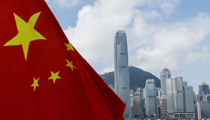 The Chinese national flag is seen in front of the financial district Central on the Chinese National Day in Hong Kong, China October 1, 2022. — Reuters