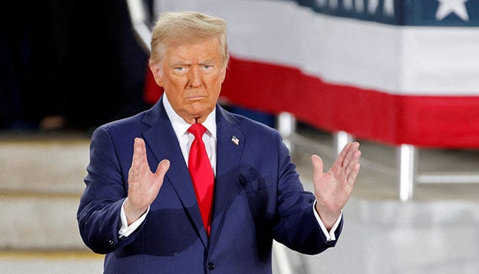 Republican then-presidential candidate and former US President Donald Trump gestures during a campaign event at Dorton Arena, in Raleigh, North Carolina, US November 4, 2024.  — Reuters