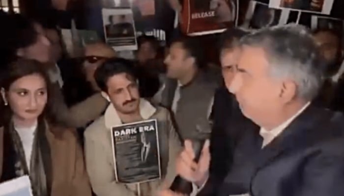 British Barrister Mark Macdonald speaks alongside PTI leaders (from L to R) Maleeka Bokhari, Azhar Mashwani and Sayed Zulfi Bukhari at a protest outside Middle Temple in London, on October 29, 2023. — Screengrab/ X/ @UKPTIOfficial