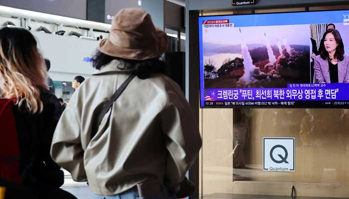 People watch a TV broadcasting a news report on North Korea firing missiles that flew 400 km after lifting off at around 7:30am from Sariwon, just south of the capital Pyongyang, at a railway station in Seoul, South Korea, November 5, 2024. — Reuters