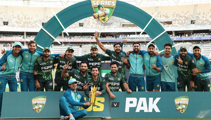 Pakistan players pose with the trophy after winning the three-match ODI series against Australia in Perth on November 10, 2024. — Facebook@PakistanCricketBoard