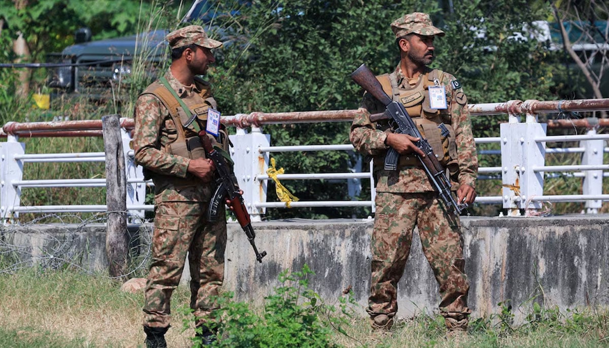 Pakistan Army soldiers stand guard at the Red Zone area in Islamabad on October 14, 2024. — Reuters