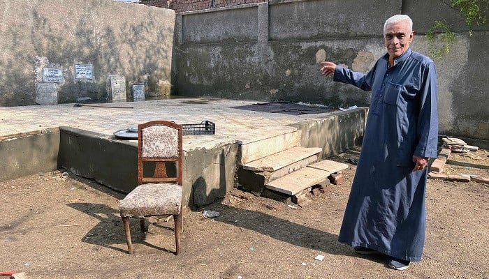 Sayyed al-Arabi, 71, who has lived and guarded the Ain Al-Sira cemetery in Old Cairo for decades November 4. — AFP