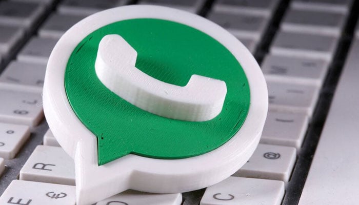 A 3D-printed WhatsApp logo is placed on the keyboard in this illustration taken April 12, 2020. — Reuters