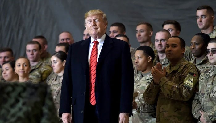 President-elect Donald Trump pictured with US Army personnel in this undated image. — AFP/File