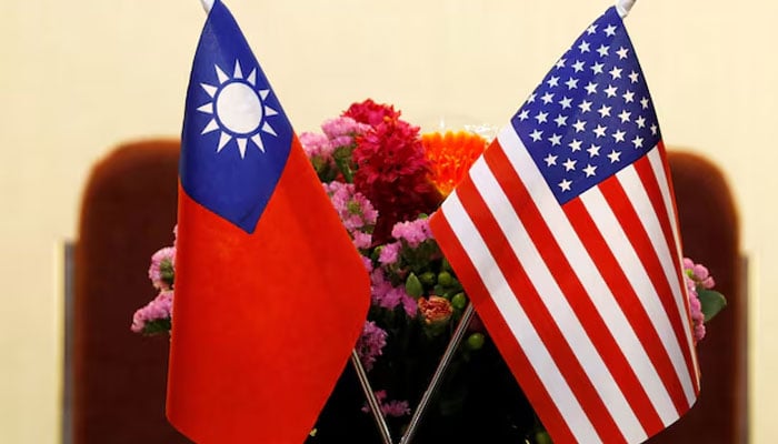 Flags of Taiwan and US are placed for a meeting in Taipei, Taiwan March 27, 2018. — Reuters