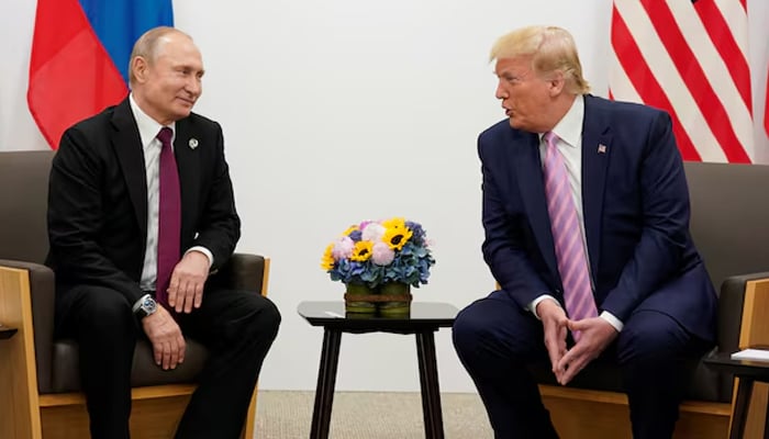 Russias President Vladimir Putin (left) and US President Donald Trump talk during a bilateral meeting at the G20 leaders summit in Osaka, Japan. — Reuters/File