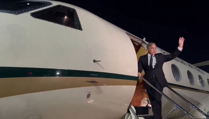 PM Shehbaz Sharif waves hands before leaving for Baku, Azerbaijan on November 11, 2024. — Screengrab via YouTube@Geo News