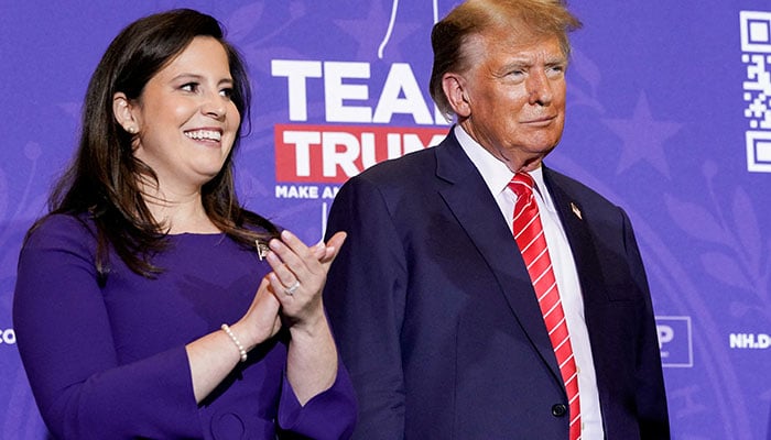 Former US President and Republican presidential candidate Donald Trump and US Representative Elise Stefanik (R-NY) attend a rally ahead of the New Hampshire primary election in Concord, New Hampshire, US January 19, 2024.  — Reuters