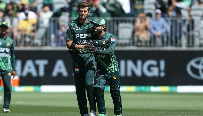 Shaheen Afridi celebrates with captain Mohammad Rizwan (R) at the Perth Stadium in Perth on November 10, 2024. — AFP