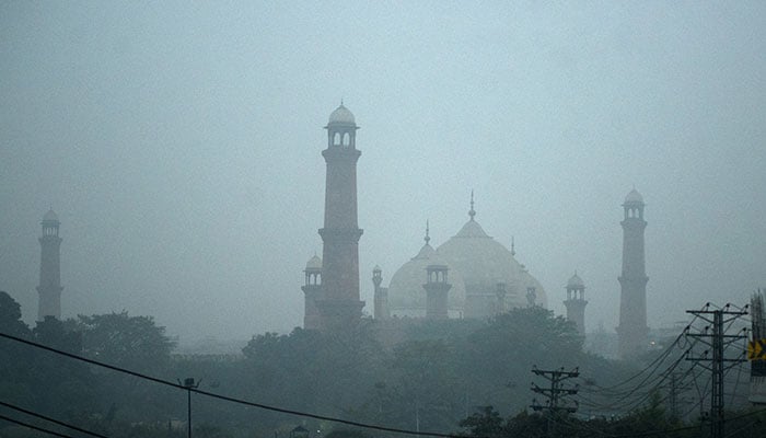 A view of the Badshahi Mosque amid smog and air pollution in Lahore on November 13, 2024. — Reuters